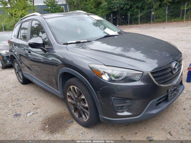  Salvage Mazda Cx
